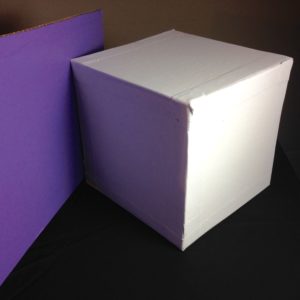 White Cube with Purple Reflected Light. Or is this a purple cube with a very bright white light on it?