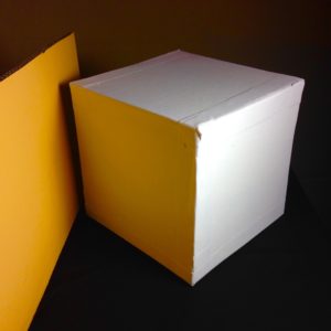 White Cube with Yellow Reflected Light. Your mind tries to tell you the cube is white but there are at least three colors here: yellow, white, and gray
