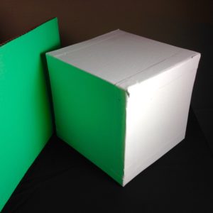 White Cube with Green Reflected Light. You may think the cube is white but it is clearly green on one side.